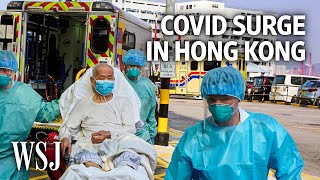 Life During Hong Kong’s Worst Covid19 Outbreak Full Hospitals Quiet Streets  WSJ [upl. by Cilegna]