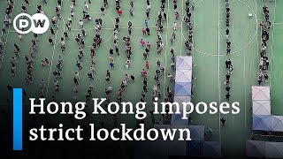 Hong Kong locks down to curb record COVID infections  DW News [upl. by Ellehcear]